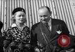 Image of Sir Hubert and Lady Wilkins speaking on arrival aboard the Hindenburg Lakehurst New Jersey USA, 1936, second 14 stock footage video 65675047077