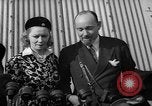 Image of Sir Hubert and Lady Wilkins speaking on arrival aboard the Hindenburg Lakehurst New Jersey USA, 1936, second 21 stock footage video 65675047077