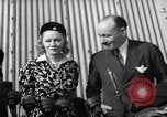 Image of Sir Hubert and Lady Wilkins speaking on arrival aboard the Hindenburg Lakehurst New Jersey USA, 1936, second 49 stock footage video 65675047077