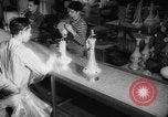 Image of popcorn stuffing New York United States USA, 1959, second 31 stock footage video 65675047253