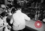 Image of popcorn stuffing New York United States USA, 1959, second 35 stock footage video 65675047253