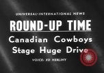 Image of herd of cattle Canada, 1959, second 3 stock footage video 65675047257