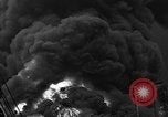 Image of fire at oil plant New Jersey United States USA, 1938, second 14 stock footage video 65675047409