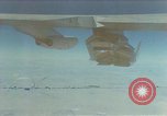 Image of X-24 lifting body aircraft suspended beneath wing of B-52 aircraft California United States USA, 1970, second 1 stock footage video 65675047491