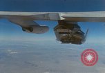 Image of X-24 lifting body aircraft suspended beneath wing of B-52 aircraft California United States USA, 1970, second 3 stock footage video 65675047491