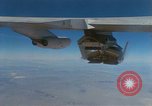 Image of X-24 lifting body aircraft suspended beneath wing of B-52 aircraft California United States USA, 1970, second 4 stock footage video 65675047491