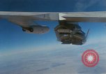 Image of X-24 lifting body aircraft suspended beneath wing of B-52 aircraft California United States USA, 1970, second 7 stock footage video 65675047491