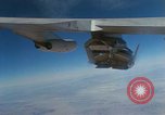 Image of X-24 lifting body aircraft suspended beneath wing of B-52 aircraft California United States USA, 1970, second 10 stock footage video 65675047491