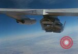 Image of X-24 lifting body aircraft suspended beneath wing of B-52 aircraft California United States USA, 1970, second 12 stock footage video 65675047491
