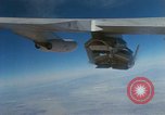 Image of X-24 lifting body aircraft suspended beneath wing of B-52 aircraft California United States USA, 1970, second 13 stock footage video 65675047491