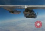 Image of X-24 lifting body aircraft suspended beneath wing of B-52 aircraft California United States USA, 1970, second 17 stock footage video 65675047491