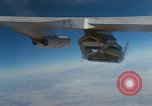 Image of X-24 lifting body aircraft suspended beneath wing of B-52 aircraft California United States USA, 1970, second 18 stock footage video 65675047491