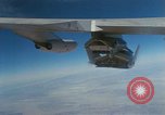 Image of X-24 lifting body aircraft suspended beneath wing of B-52 aircraft California United States USA, 1970, second 22 stock footage video 65675047491