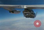 Image of X-24 lifting body aircraft suspended beneath wing of B-52 aircraft California United States USA, 1970, second 24 stock footage video 65675047491
