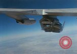 Image of X-24 lifting body aircraft suspended beneath wing of B-52 aircraft California United States USA, 1970, second 26 stock footage video 65675047491