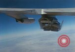 Image of X-24 lifting body aircraft suspended beneath wing of B-52 aircraft California United States USA, 1970, second 28 stock footage video 65675047491