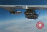 Image of X-24 lifting body aircraft suspended beneath wing of B-52 aircraft California United States USA, 1970, second 32 stock footage video 65675047491