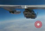 Image of X-24 lifting body aircraft suspended beneath wing of B-52 aircraft California United States USA, 1970, second 33 stock footage video 65675047491