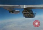 Image of X-24 lifting body aircraft suspended beneath wing of B-52 aircraft California United States USA, 1970, second 34 stock footage video 65675047491