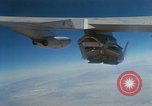 Image of X-24 lifting body aircraft suspended beneath wing of B-52 aircraft California United States USA, 1970, second 35 stock footage video 65675047491
