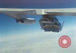 Image of X-24 lifting body aircraft suspended beneath wing of B-52 aircraft California United States USA, 1970, second 43 stock footage video 65675047491