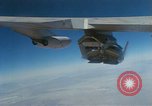 Image of X-24 lifting body aircraft suspended beneath wing of B-52 aircraft California United States USA, 1970, second 44 stock footage video 65675047491