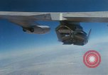 Image of X-24 lifting body aircraft suspended beneath wing of B-52 aircraft California United States USA, 1970, second 45 stock footage video 65675047491