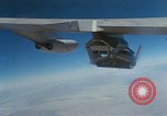 Image of X-24 lifting body aircraft suspended beneath wing of B-52 aircraft California United States USA, 1970, second 47 stock footage video 65675047491