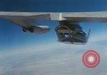 Image of X-24 lifting body aircraft suspended beneath wing of B-52 aircraft California United States USA, 1970, second 50 stock footage video 65675047491