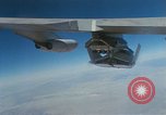 Image of X-24 lifting body aircraft suspended beneath wing of B-52 aircraft California United States USA, 1970, second 52 stock footage video 65675047491