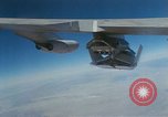 Image of X-24 lifting body aircraft suspended beneath wing of B-52 aircraft California United States USA, 1970, second 53 stock footage video 65675047491