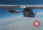 Image of X-24 lifting body aircraft suspended beneath wing of B-52 aircraft California United States USA, 1970, second 57 stock footage video 65675047491