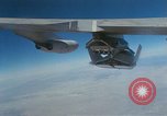 Image of X-24 lifting body aircraft suspended beneath wing of B-52 aircraft California United States USA, 1970, second 60 stock footage video 65675047491