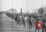 Image of Japanese troops on the Road to Mandalay Burma, 1942, second 20 stock footage video 65675047519