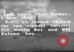 Standbild P-47 Thunderbolts geladen auf Flugzeugträger Ford Island Pearl Harbor Hawaii USA, 1944, aus Sekunde 11 historischem Filmmaterial Videoclip 65675047534