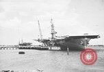 Standbild P-47 Thunderbolts geladen auf Flugzeugträger Ford Island Pearl Harbor Hawaii USA, 1944, aus Sekunde 18 historischem Filmmaterial Videoclip 65675047534