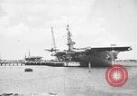 Standbild P-47 Thunderbolts geladen auf Flugzeugträger Ford Island Pearl Harbor Hawaii USA, 1944, aus Sekunde 24 historischem Filmmaterial Videoclip 65675047534