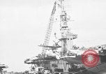 Standbild P-47 Thunderbolts geladen auf Flugzeugträger Ford Island Pearl Harbor Hawaii USA, 1944, aus Sekunde 29 historischem Filmmaterial Videoclip 65675047534