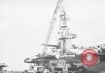 Standbild P-47 Thunderbolts geladen auf Flugzeugträger Ford Island Pearl Harbor Hawaii USA, 1944, aus Sekunde 30 historischem Filmmaterial Videoclip 65675047534