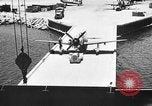 Standbild P-47 Thunderbolts geladen auf Flugzeugträger Ford Island Pearl Harbor Hawaii USA, 1944, aus Sekunde 32 historischem Filmmaterial Videoclip 65675047534