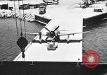 Standbild P-47 Thunderbolts geladen auf Flugzeugträger Ford Island Pearl Harbor Hawaii USA, 1944, aus Sekunde 33 historischem Filmmaterial Videoclip 65675047534