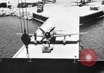 Standbild P-47 Thunderbolts geladen auf Flugzeugträger Ford Island Pearl Harbor Hawaii USA, 1944, aus Sekunde 34 historischem Filmmaterial Videoclip 65675047534
