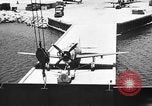 Standbild P-47 Thunderbolts geladen auf Flugzeugträger Ford Island Pearl Harbor Hawaii USA, 1944, aus Sekunde 35 historischem Filmmaterial Videoclip 65675047534
