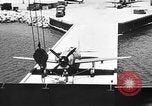 Standbild P-47 Thunderbolts geladen auf Flugzeugträger Ford Island Pearl Harbor Hawaii USA, 1944, aus Sekunde 36 historischem Filmmaterial Videoclip 65675047534