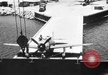 Standbild P-47 Thunderbolts geladen auf Flugzeugträger Ford Island Pearl Harbor Hawaii USA, 1944, aus Sekunde 37 historischem Filmmaterial Videoclip 65675047534