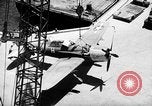 Standbild P-47 Thunderbolts geladen auf Flugzeugträger Ford Island Pearl Harbor Hawaii USA, 1944, aus Sekunde 44 historischem Filmmaterial Videoclip 65675047534