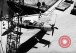 Standbild P-47 Thunderbolts geladen auf Flugzeugträger Ford Island Pearl Harbor Hawaii USA, 1944, aus Sekunde 45 historischem Filmmaterial Videoclip 65675047534