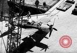 Standbild P-47 Thunderbolts geladen auf Flugzeugträger Ford Island Pearl Harbor Hawaii USA, 1944, aus Sekunde 47 historischem Filmmaterial Videoclip 65675047534