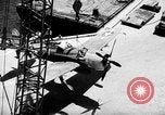 Standbild P-47 Thunderbolts geladen auf Flugzeugträger Ford Island Pearl Harbor Hawaii USA, 1944, aus Sekunde 48 historischem Filmmaterial Videoclip 65675047534