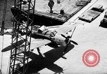 Standbild P-47 Thunderbolts geladen auf Flugzeugträger Ford Island Pearl Harbor Hawaii USA, 1944, aus Sekunde 49 historischem Filmmaterial Videoclip 65675047534
